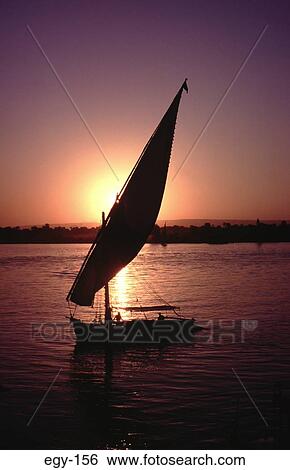 Sun Behind Sailing Boat Luxor Egypt View Large Photo Image Stock Photograph - Sun Behind Sailing Boat Luxor Egypt. Fotosearch