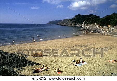 Tourists Sunbathing Caswell Gower Beach Wales View Large Photo Image Stock Image - Tourists Sunbathing Caswell Gower Beach Wales. Fotosearch