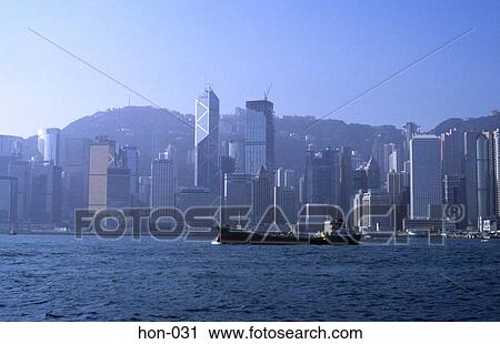 Transport Ship Sailing Past Skyscrapers Hong Kong View Large Photo Image Stock Image - Transport Ship Sailing Past Skyscrapers Hong Kong. Fotosearch