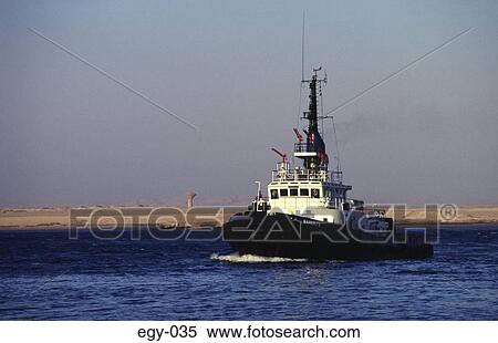 Stock Photography - Tug on the Suez Canal Egypt Africa. Fotosearch