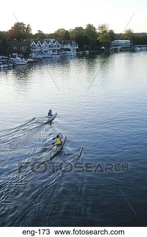 Stock Image - Two Kayaks on River Thames UK. Fotosearch