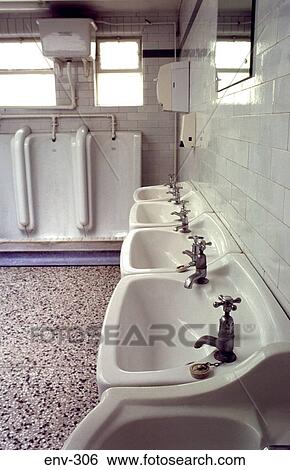 Stock Photograph - Urinals and Basins in Public Toilets. Fotosearch