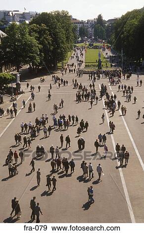 Visitors to the Basilica of Lourdes France View Large Photo Image Stock Photo - Visitors to the Basilica of Lourdes France. Fotosearch