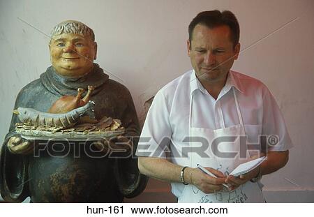 Waiter and Monk Figure Szentendre Hungary View Large Photo Image Stock Image - Waiter and Monk Figure Szentendre Hungary. Fotosearch
