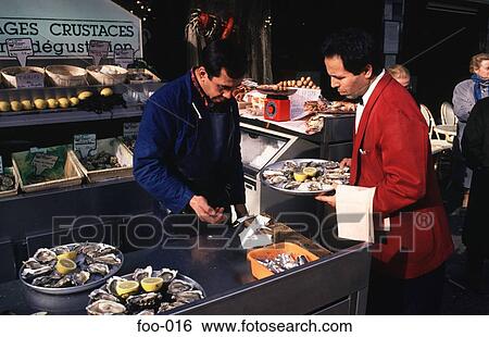 Waiters at Seafood Bar View Large Photo Image Stock Photograph - Waiters at Seafood Bar. Fotosearch