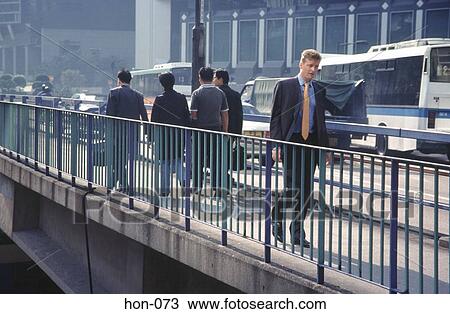 Western Businessman on Bridge Hong Kong View Large Photo Image Stock Image - Western Businessman on Bridge Hong Kong. Fotosearch
