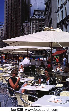 Women at a Table in an Open Air Cafe Antwerp Belgium View Large Photo Image Stock Photo - Women at a Table in an Open Air Cafe Antwerp Belgium. Fotosearch