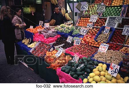 Women Buying Produce at Fruit And Vegetable Stall View Large Photo Image Stock Image - Women Buying Produce at Fruit And Vegetable Stall. Fotosearch