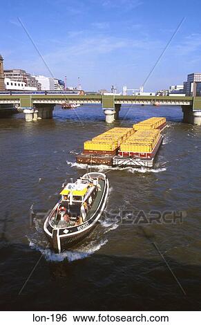 Barge Carrying Containers Through London UK View Large Photo Image Stock Photograph - Barge Carrying Containers Through London UK. Fotosearch