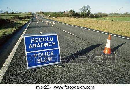 Bilingual Road Sign Wales UK View Large Photo Image Stock Photo - Bilingual Road Sign Wales UK. Fotosearch