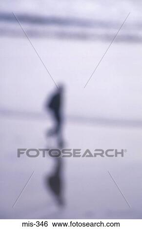Blurred View of Man Running on Beach UK View Large Photo Image Stock Photograph - Blurred View of Man Running on Beach UK. Fotosearch