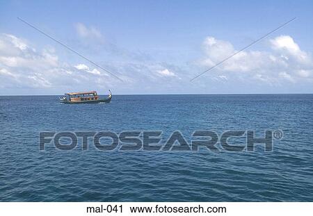 Stock Image - Boat Maldives. Fotosearch