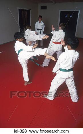 Stock Photo - Boys Practising Karate UK. Fotosearch