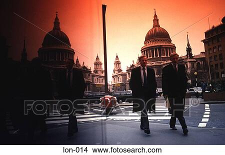 Picture - Businessmen and Reflection of St Paul's Cathedral UK. Fotosearch