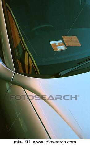 Car with Disabled Parking Permit View Large Photo Image Stock Image - Car with Disabled Parking Permit. Fotosearch