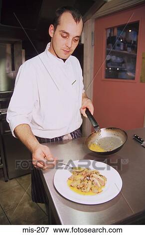Chef Preparing Food UK View Large Photo Image Stock Photo - Chef Preparing Food UK. Fotosearch