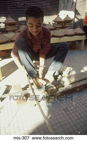 Child Labour Marakesh Morocco View Large Photo Image Stock Photo - Child Labour Marakesh Morocco. Fotosearch