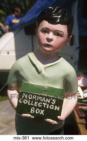 Stock Image - Collection Box in the Shape of a Boy UK. Fotosearch