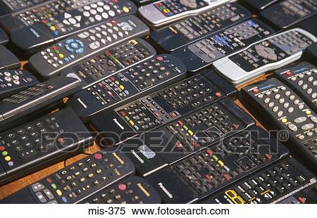 Collection of Remote Controls UK View Large Photo Image Stock Photography - Collection of Remote Controls UK. Fotosearch
