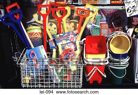 Picture - Coloured Buckets and Spades Outside Shop. Fotosearch