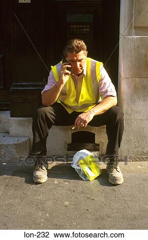 Construction Worker on Mobile Phone London UK View Large Photo Image Stock Image - Construction Worker on Mobile Phone London UK. Fotosearch