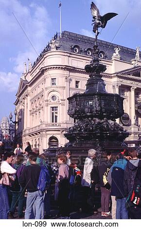 Stock Photo - Crowd Around Eros Fountain Piccadilly Circus London. Fotosearch