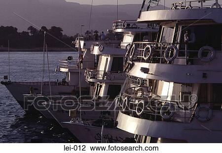 Cruise Boats on the Nile Egypt View Large Photo Image Stock Image - Cruise Boats on the Nile Egypt. Fotosearch