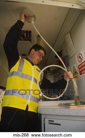 Customs Officer Testing Diesel UK View Large Photo Image Stock Photo - Customs Officer Testing Diesel UK. Fotosearch