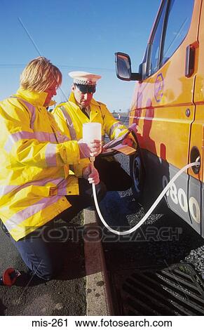 Customs Officers Testing Fuel UK View Large Photo Image Stock Image - Customs Officers Testing Fuel UK. Fotosearch