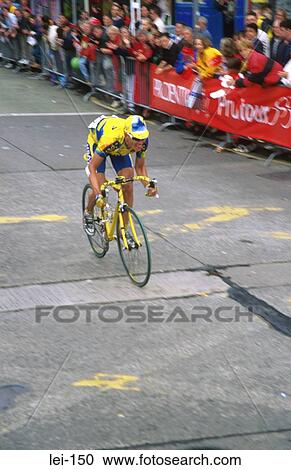 Cyclist Racing through Town View Large Photo Image Stock Image - Cyclist Racing through Town. Fotosearch