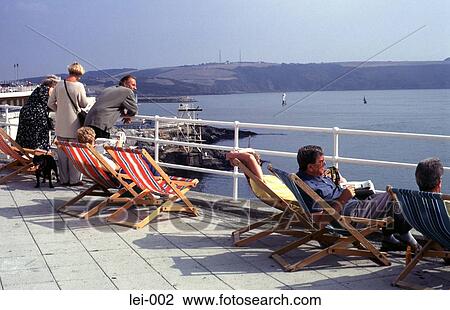 Deckchairs on Promenade at a Seaside Resort UK View Large Photo Image Stock Image - Deckchairs on Promenade at a Seaside Resort UK. Fotosearch