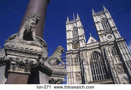 Stock Image - Decorative Lamppost and Western Towers Westminster Abbey London UK. Fotosearch