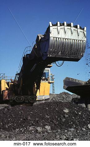 Digger Scooping Up Coal Trimsaran Mine Wales View Large Photo Image Stock Photo - Digger Scooping Up Coal Trimsaran Mine Wales. Fotosearch