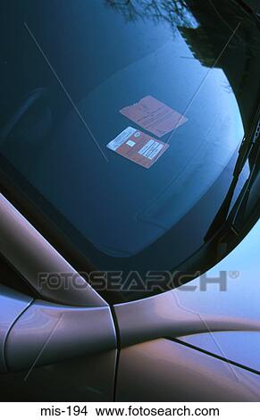 Picture - Disabled Parking Permit in Car Windscreen. Fotosearch