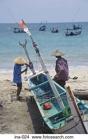 Fishermen with Boat on Beach Kelan Bali View Large Photo Image Picture - Fishermen with Boat on Beach Kelan Bali. Fotosearch