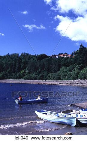 Fishing Boats Rowing on a Lake UK View Large Photo Image Stock Image - Fishing Boats Rowing on a Lake UK. Fotosearch