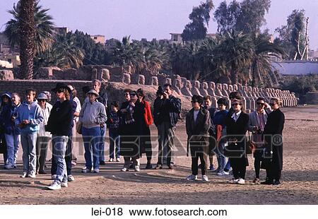 Stock Photo - Group of Tourists on a Guided Tour Luxor Egypt. Fotosearch