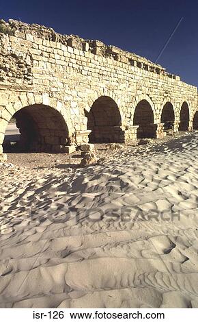 Higher Roman Aqueduct in Sand Dunes Caesarea Israel View Large Photo Image Stock Photograph - Higher Roman Aqueduct in Sand Dunes Caesarea Israel. Fotosearch