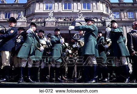 Stock Image - Horn Players in Green Uniform. Fotosearch