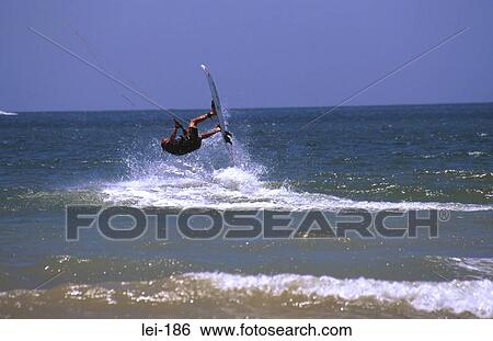 Stock Photograph - Kite Surfer doing a Flip. Fotosearch