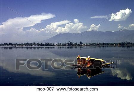 Landscape and Sky reflected in Lake Dal India View Large Photo Image Stock Photo - Landscape and Sky reflected in Lake Dal India. Fotosearch