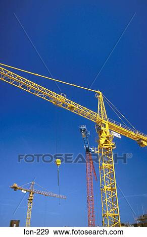 Large Cranes in Construction Site London UK View Large Photo Image Stock Photo - Large Cranes in Construction Site London UK. Fotosearch