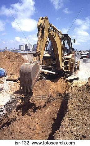 Large Road Digger by Hole Jaffa Israel View Large Photo Image Stock Image - Large Road Digger by Hole Jaffa Israel. Fotosearch