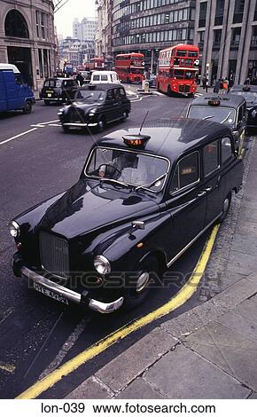 London Taxi Parked on a Yellow Line London UK View Large Photo Image Stock Photo - London Taxi Parked on a Yellow Line London UK. Fotosearch