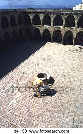 Man at Stall by Well Head Khan-al-Umdan Akko Israel View Large Photo Image Stock Image - Man at Stall by Well Head Khan-al-Umdan Akko Israel. Fotosearch