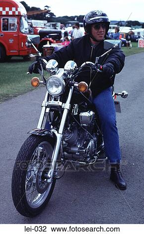 Man on a Motorbike UK View Large Photo Image Stock Image - Man on a Motorbike UK. Fotosearch