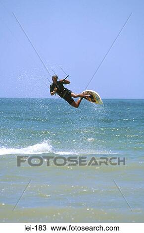 Man Performing Kite Surfing Jump View Large Photo Image Stock Image - Man Performing Kite Surfing Jump. Fotosearch