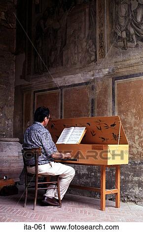 Man Playing Harpsichord in Medieval Building Italy View Large Photo Image Stock Image - Man Playing Harpsichord in Medieval Building Italy. Fotosearch
