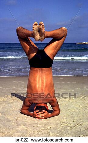 Man Standing on Head on Beach Tel Aviv Israel View Large Photo Image Stock Image - Man Standing on Head on Beach Tel Aviv Israel. Fotosearch