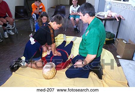 Man Teaching School Children First Aid View Large Photo Image Stock Photo - Man Teaching School Children First Aid. Fotosearch